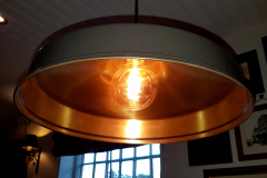 Metallic-light-fitting-in-a-restaurant