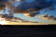 Dusk-sky-over-Barmouth-beach-with-interspersed-clouds