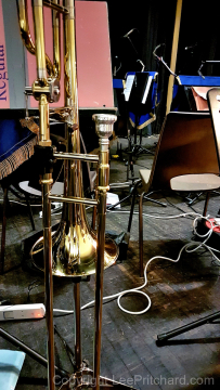 Backstage-band-view-with-close-up-of-a-trombone